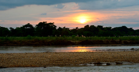 Pirogues on the Rapti river in Chitwan, Nepal