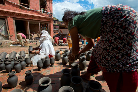 People making pottery on the one of Bhaktapur squares&#65292;Nepalのeditorial素材