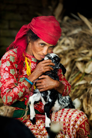 Old tharu women working in nepal countryside.のeditorial素材