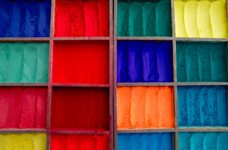 Colorful powder paints in a market in Nepalの写真素材