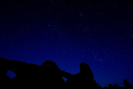 The Milky Way over the arches in Delicate Arch