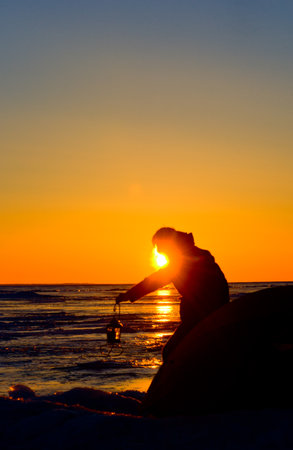 Man camping in the wilderness ,Huron lakeの写真素材