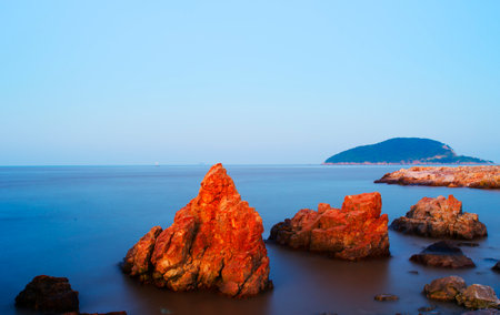 Rock in the sea with long exposure shootingの写真素材