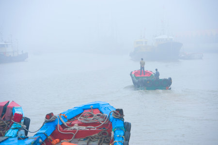 Foggy Boat on Seaside pierの写真素材