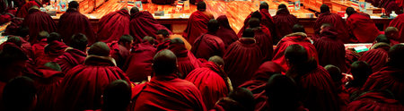 Tibetan Buddist monks is debating at Sichuan Buddhist College