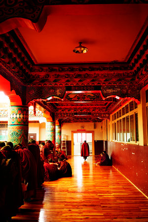 Tibetan Buddist monks is debating at Sichuan Buddhist College