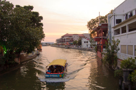 Melacca, Malaysia, February 13, 2012 - the cruise boat cruising along the melacca riverのeditorial素材
