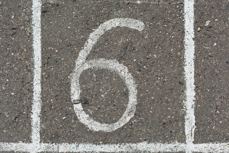 Hopscotch chalk white number 6の写真素材