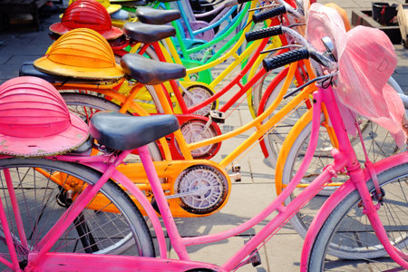 colorful bicycles and hatsの写真素材