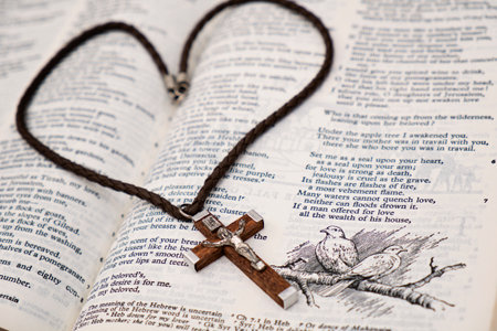 Wooden Crucifix pendant and Holy Bibleの写真素材