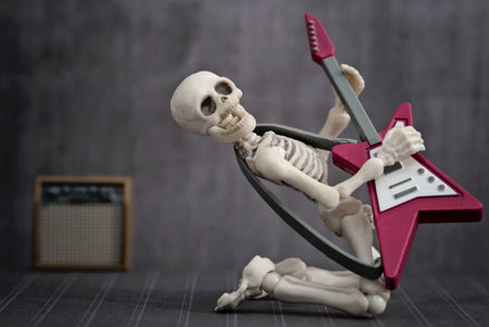 A Skeleton playing rock electric guitarの写真素材