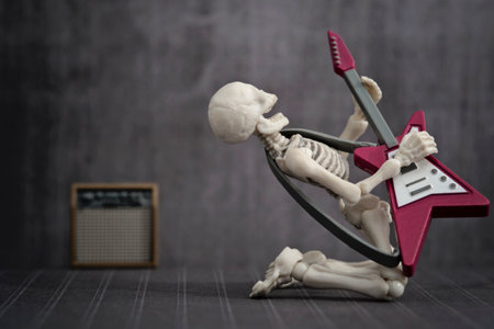 A Skeleton playing rock electric guitarの写真素材
