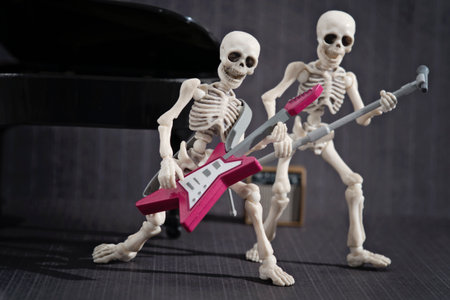 Two skeleton playing rock musicの写真素材