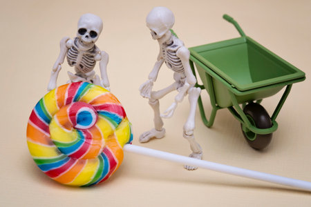 Two skeletons hauling lollipopの写真素材