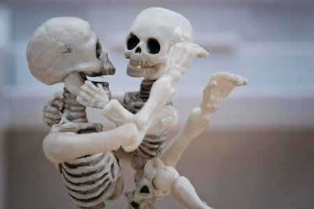 Skeleton hugging his childの写真素材