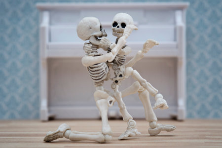 Skeleton hugging his childの写真素材