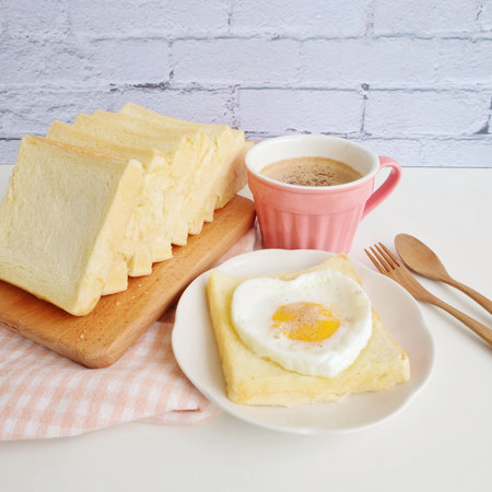 Bread, egg and cup of coffeeの写真素材