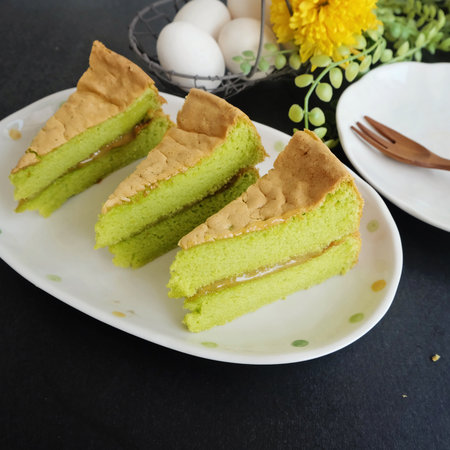Pandan sponge cakes and eggs for breakfastの写真素材