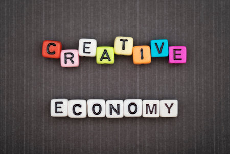 CREATIVE ECONOMY, by colorful alphabet beadsの写真素材