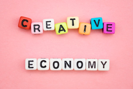 CREATIVE ECONOMY, by colorful alphabet beadsの写真素材