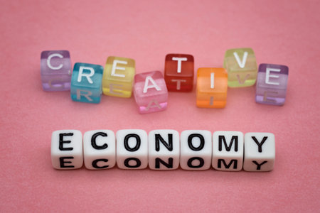 CREATIVE ECONOMY, by colorful alphabet beadsの写真素材
