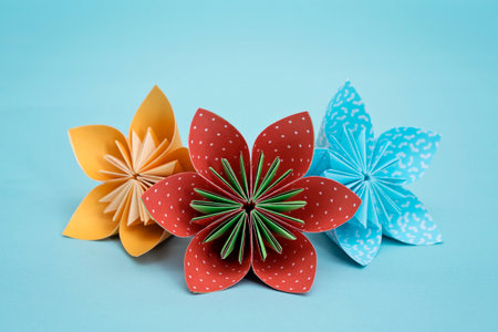 Flower origami with blue backgroundの写真素材