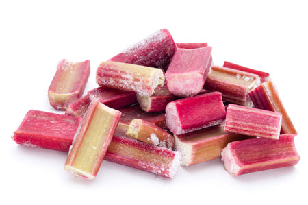 Frozen rhubarb pieces on white background の写真素材