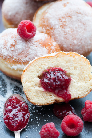 Fresh donuts filled with raspberry preserves.の写真素材