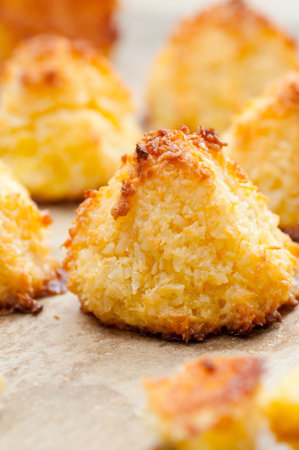 Freshly coconut macaroons on a baking sheet.の写真素材