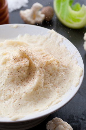 Homemade mashed cauliflower spiced with grated nutmeg.の写真素材