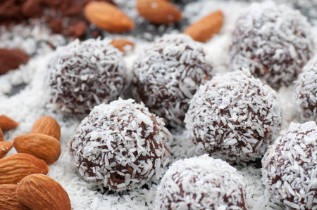 Almond and cacao candy balls rolled in cocos.の写真素材