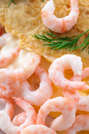 Omelet with shrimps and dill.の写真素材