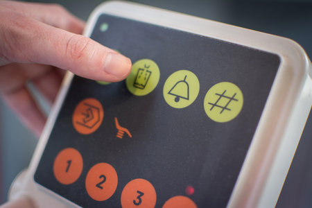 Close-up of hand pushing the button on medical machine in dental office.の写真素材