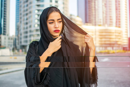 Portrait of beautiful middle eastern Arabian young woman wearing traditional arabic clothing.