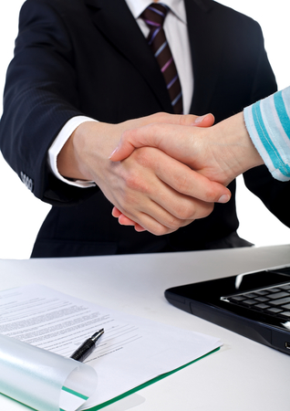 The businessman shaking hands with the client の写真素材