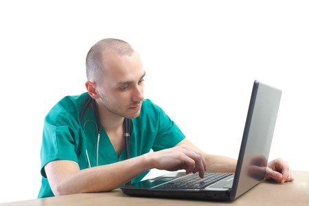 Portrait of a young male doctor at workの写真素材