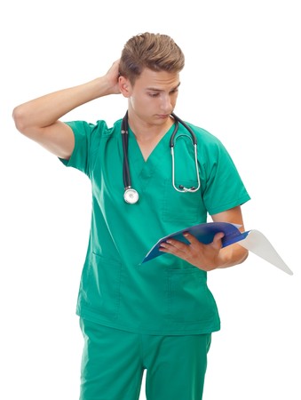 Portrait of a thoughtful male doctor on isolated backgroundの写真素材
