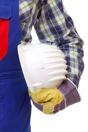 Close-up of a male worker holding hardhatの写真素材