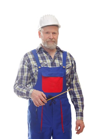 Portrait of a worker useing a tape measureの写真素材