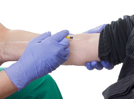 Close up of an elderly hand when she get the injectionの写真素材