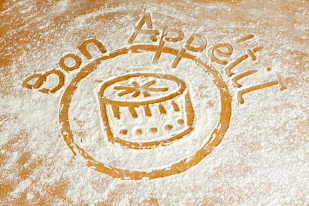 Close up of bon appetit words written in flourの写真素材