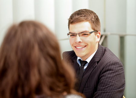 Picture of a confident businessman sitting in his officeの写真素材