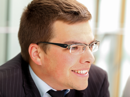 Picture of a confident businessman sitting in his officeの写真素材