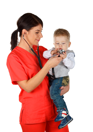 Picture of a pediatrician holding a childの写真素材