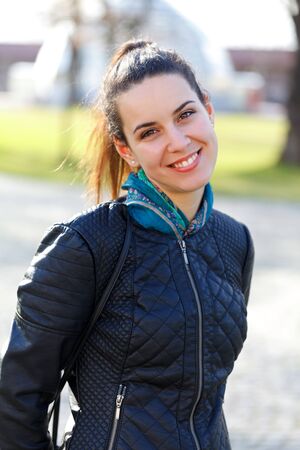 Picture of a beautiful young woman outdoorの写真素材