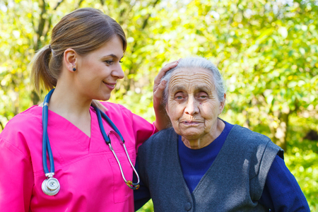 Picture of a senior woman with her caregiverの写真素材