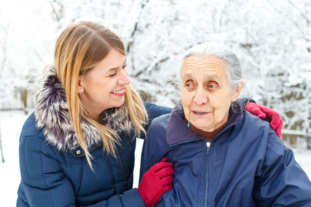 Picture of a young woman speding time with her grandmotherの写真素材