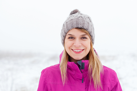 Portrait of a young woman on wintertimeの写真素材