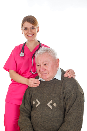 Picture of an old man with prostate problems and his smiling doctorの写真素材
