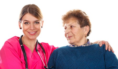 Picture of an old lady with her physician - isolated backgroundの写真素材